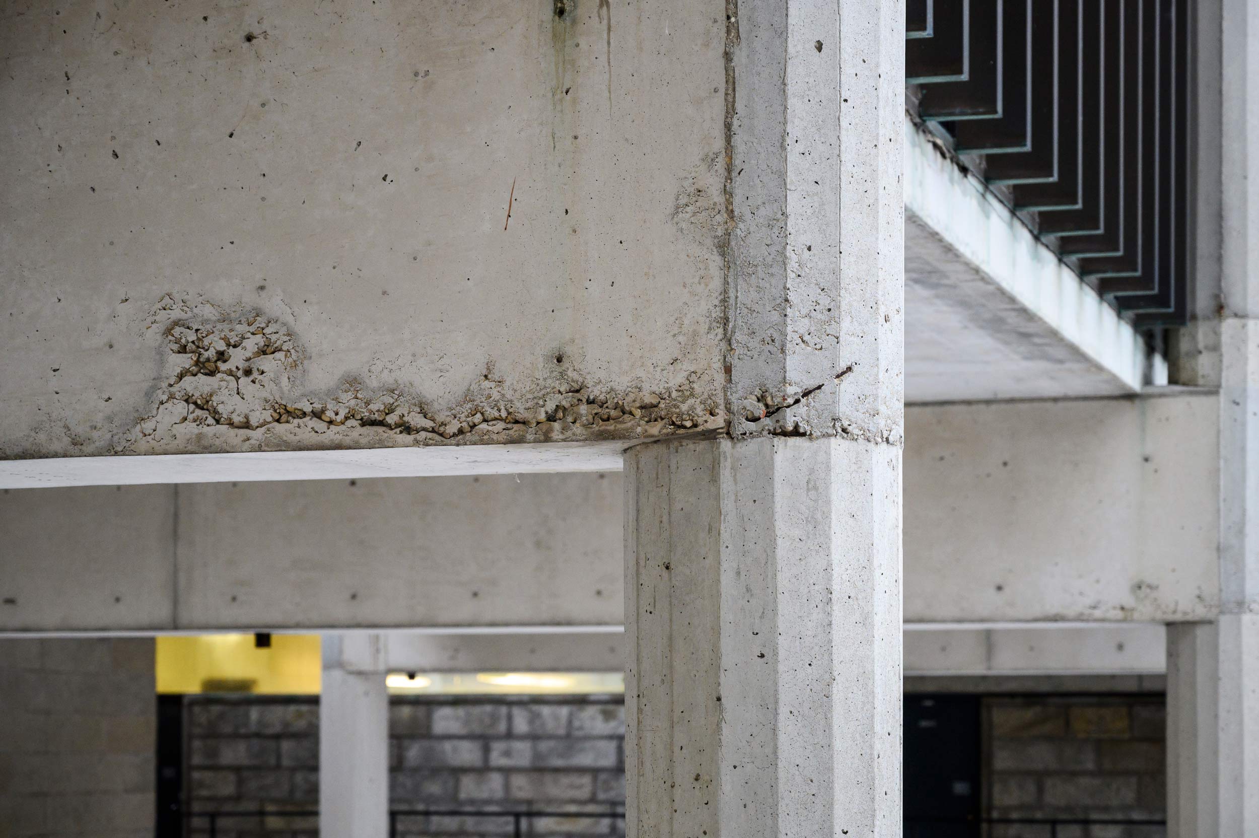 Deteriorated concrete on the exterior of the Humanities Building.